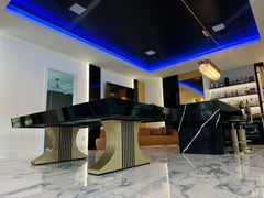 Art Deco pool table with gold dipped metal base by Pool Table Portfolio in a Zamira Ariza Interiors designed room