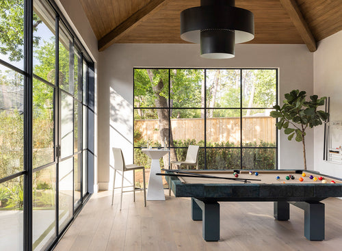 Pairing Wood and Lighting: The Alchemy of the Game Room